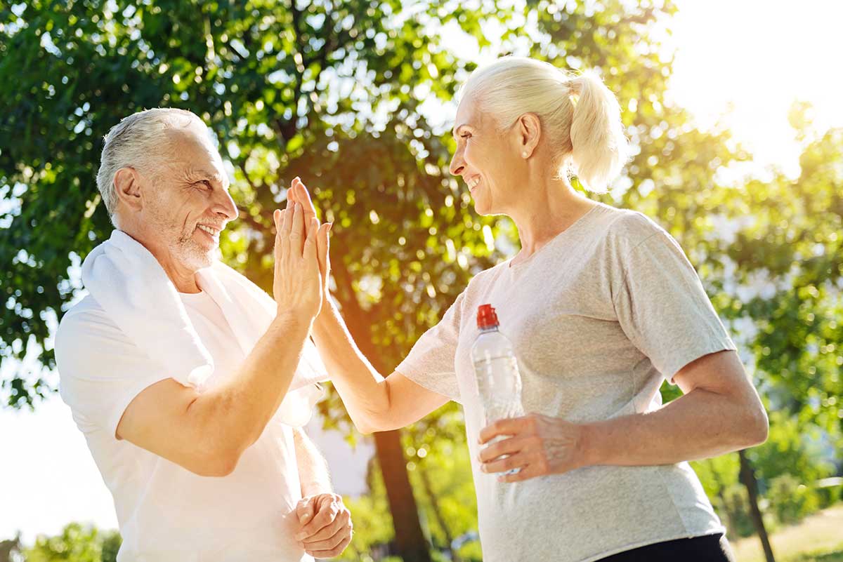 wellness couple learning about senior wellness and the dimensions of wellness