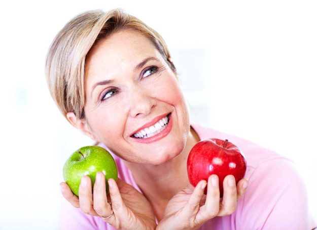Senior woman with apple. Diet. Senior woman with apple. Diet.