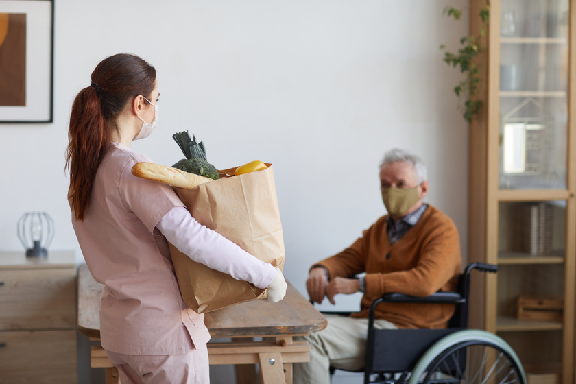 Food Delivery for Senior Man in Wheelchair Food Delivery for Senior Man in Wheelchair