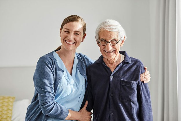 Female doctor with stethoscope in nursing home