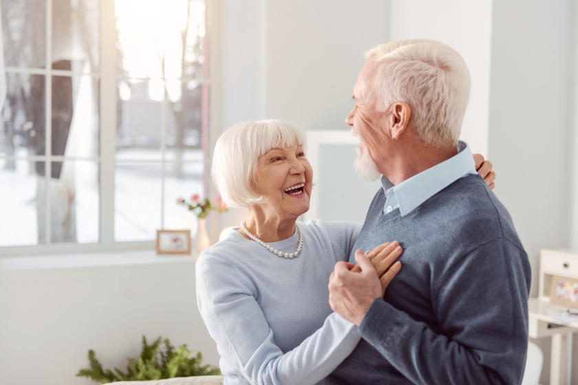 Happy senior couple dancing in the living room When Seniors Lack A Sense Of Purpose: Is Moving To Independent Living In Palm Beach County, FL A Good Option?