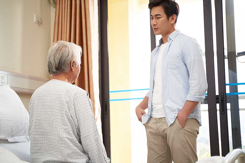 adult son visiting father in hospital adult son visiting father in hospital