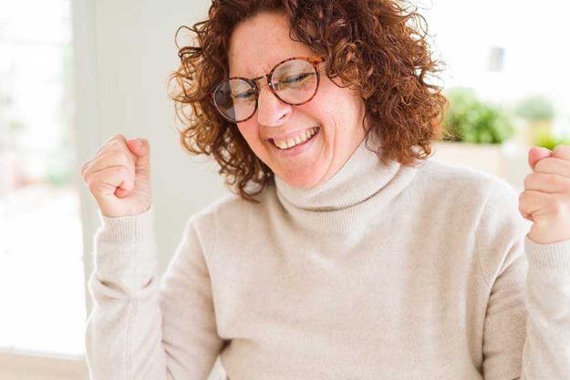 Beautiful senior woman wearing turtleneck sweater Beautiful senior woman wearing turtleneck sweater