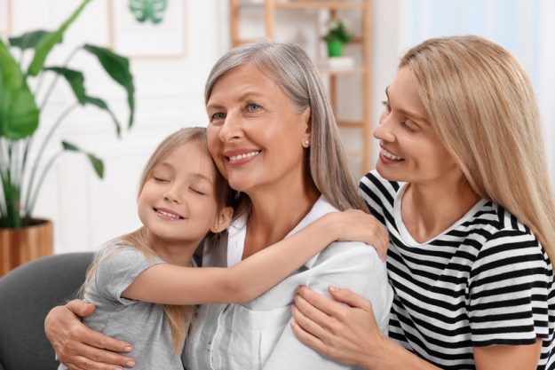 Three generations. Happy grandmother, her daughter and granddaug