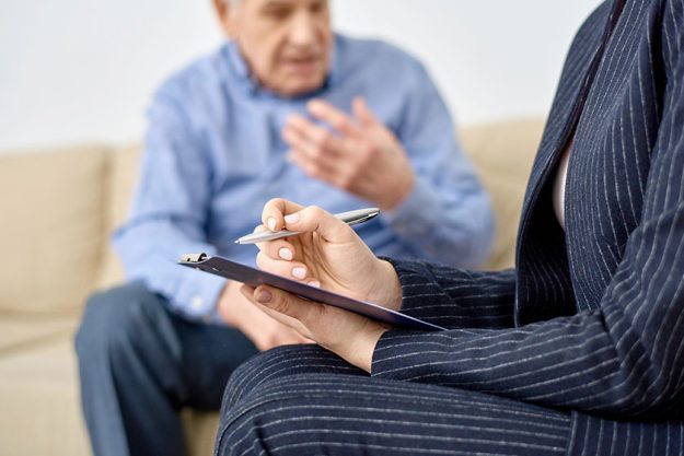 close shot female psychologist wearing elegant suit taking necessary notes close shot female psychologist wearing elegant suit taking necessary notes