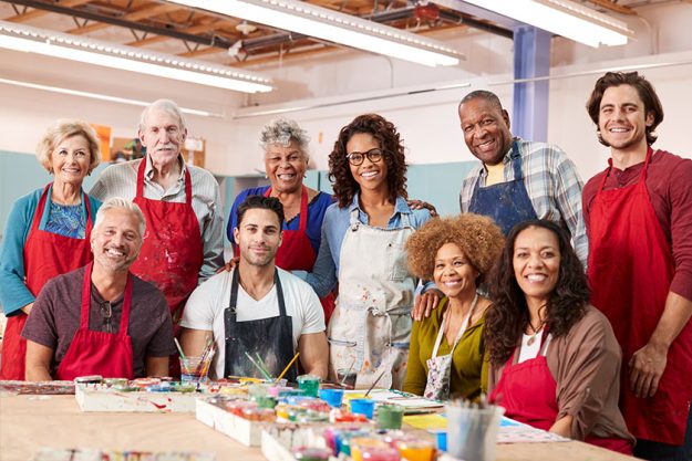 Portrait Of Mature Adults Attending Art Class