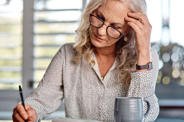 Im gonna need to take something for this pain…an attractive senior businesswoman suffering with a headache while working from home Im gonna need to take something for this pain...an attractive senior businesswoman suffering with a headache while working from home
