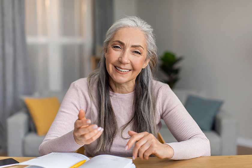 glad smiling european mature female teacher gray hair have meeting glad smiling european mature female teacher gray hair have meeting