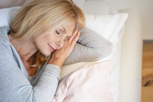 pleased face of sleeping woman stock photo pleased face of sleeping woman stock photo