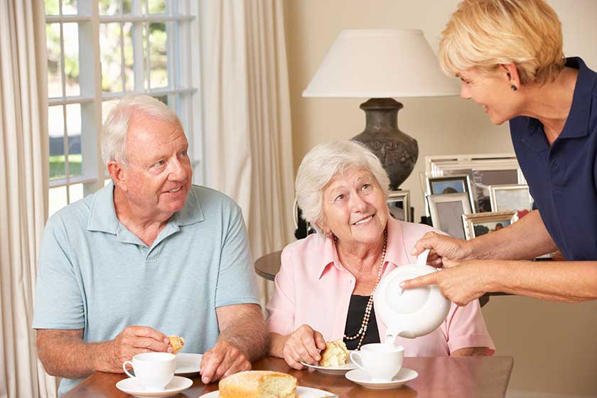 senior couple enjoying afternoon tea senior couple enjoying afternoon tea