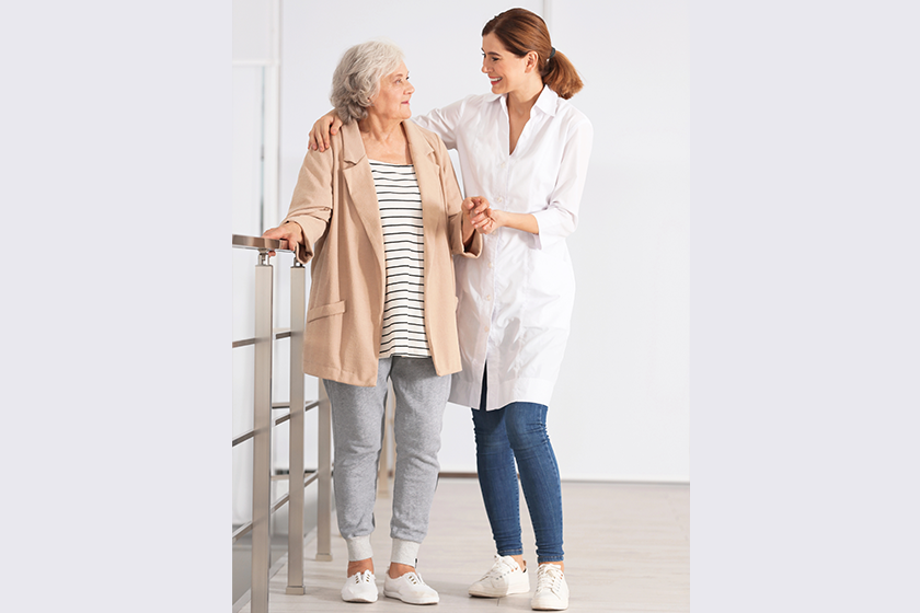 elderly woman female caregiver elderly woman female caregiver