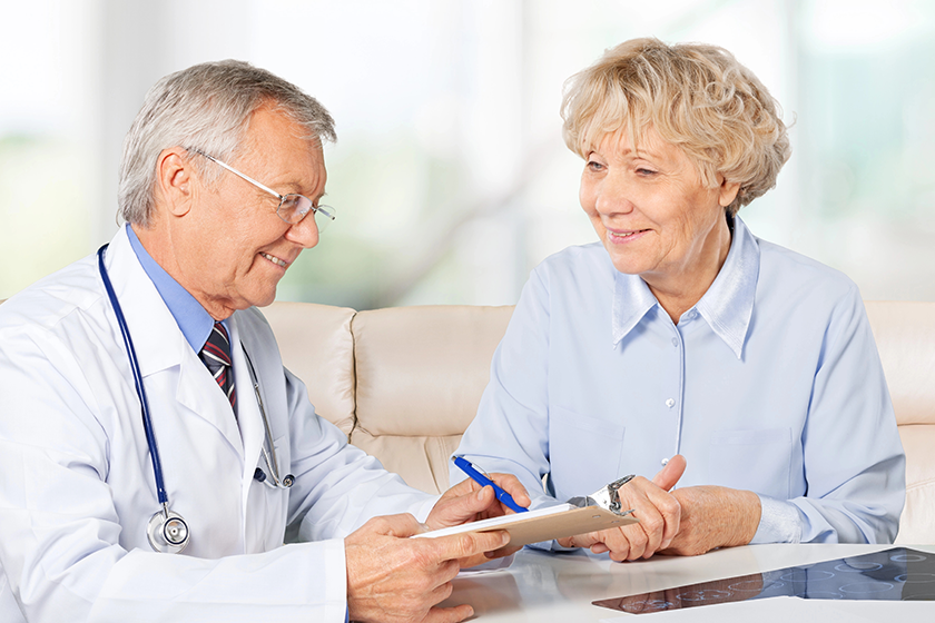female senior patient visiting a doctor female senior patient visiting a doctor