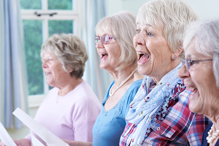 group senior women singing choir