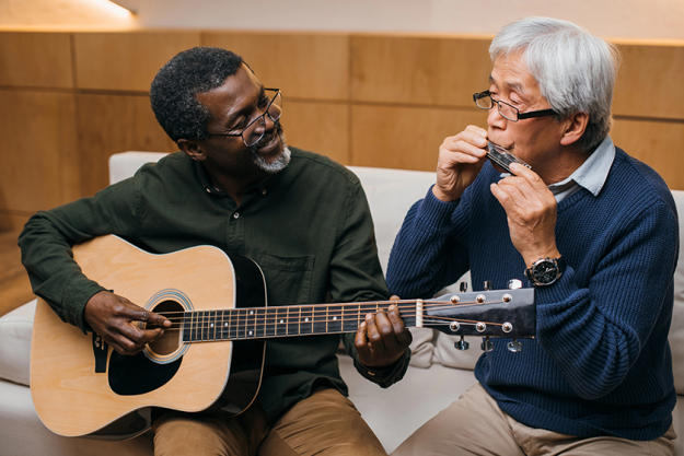 senior friends playing music senior friends playing music