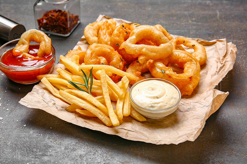 tasty onion rings french fries sauces