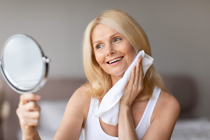 happy middle aged woman looking herself happy middle aged woman looking herself